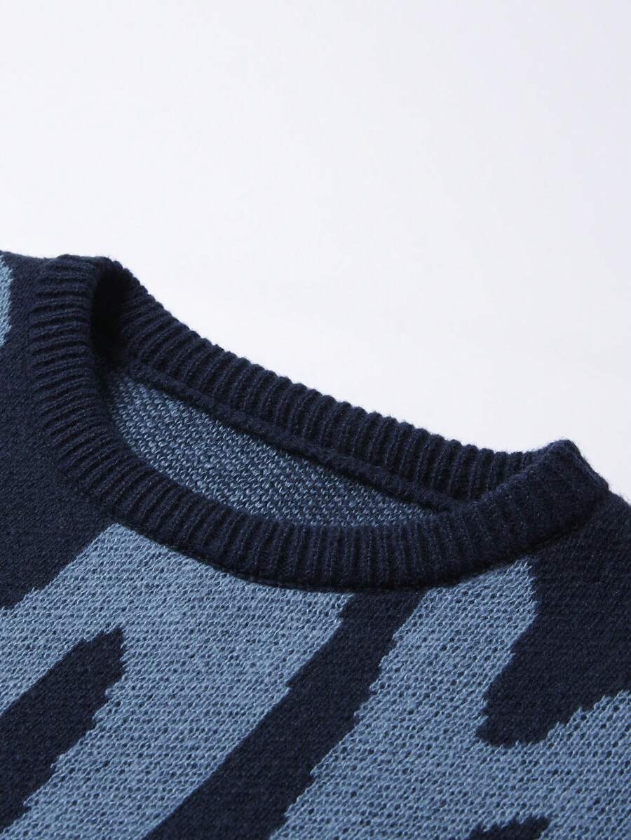 Manfinity Hypemode Casual men's sweater with Round neck, Long Sleeves, and Graphic detail