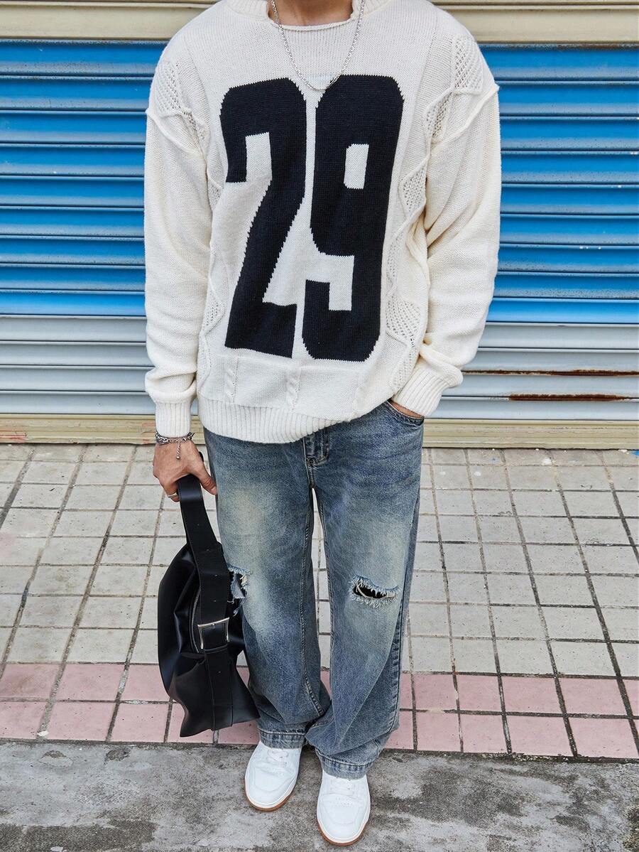 Manfinity Hypemode Casual men's sweater with Round neck, Long Sleeves, and Graphic detail