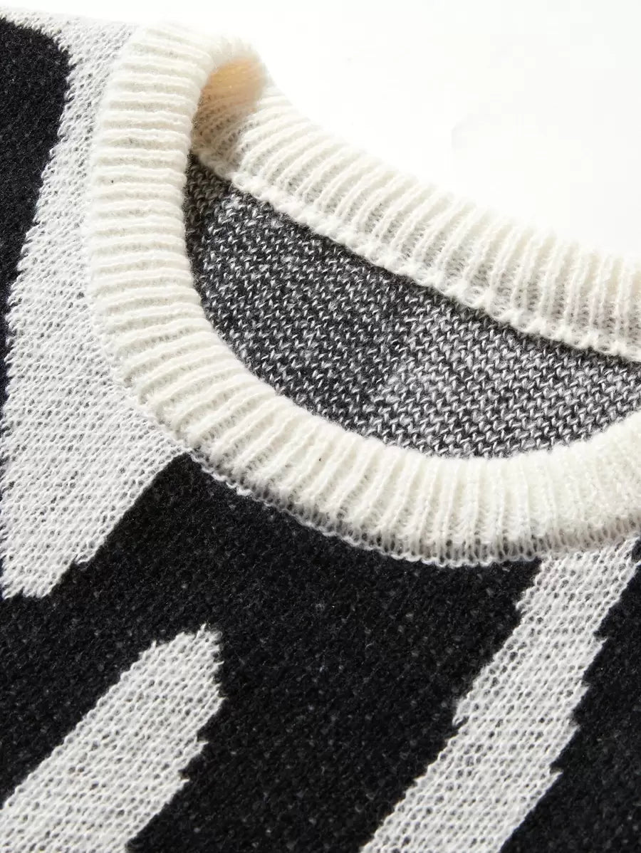 Manfinity Hypemode Casual men's sweater with Round neck, Long Sleeves, and Graphic detail