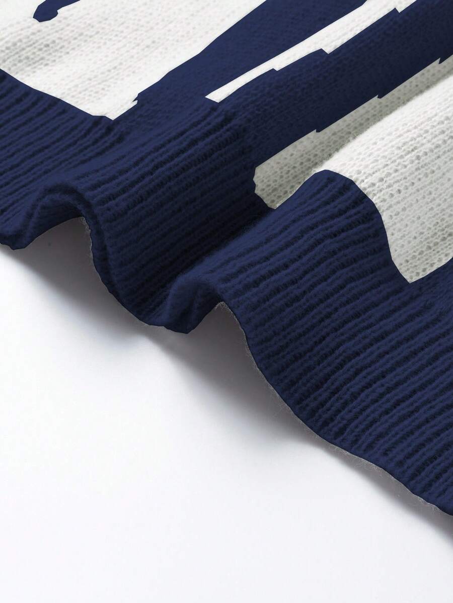Manfinity Hypemode Casual men's sweater with Round neck, Long Sleeves, and Graphic detail