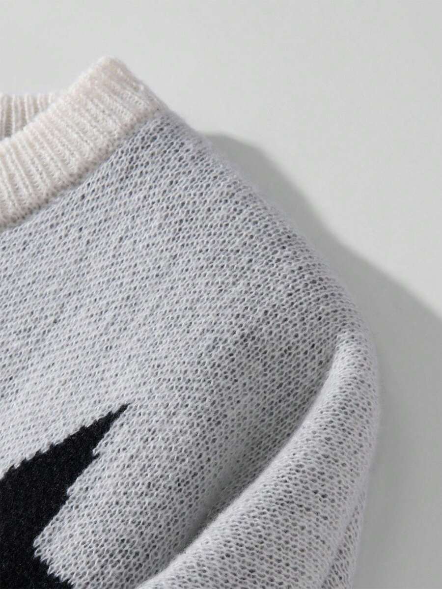 Manfinity Hypemode Casual men's sweater with Round neck, Long Sleeves, and Graphic detail